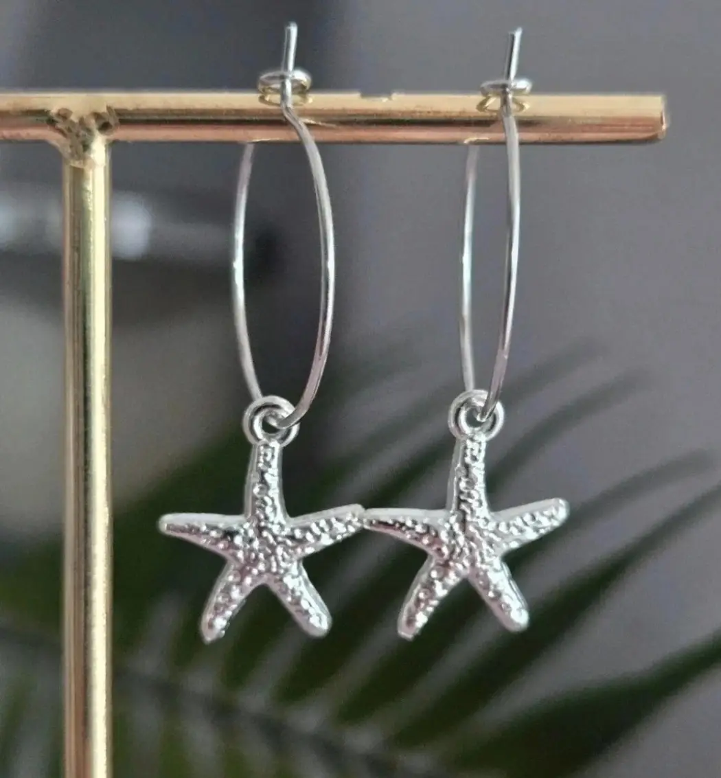 Gorgeous silver starfish hoops