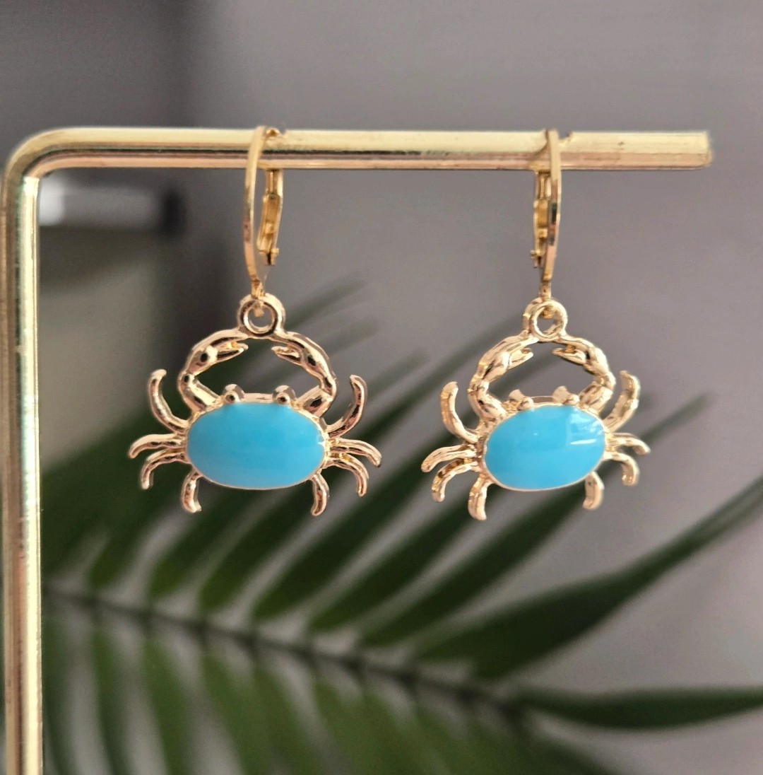 Gorgeous blue and gold crab huggie hoops