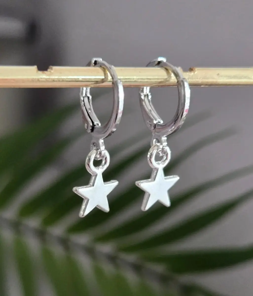 Beautiful little silver star huggie hoops