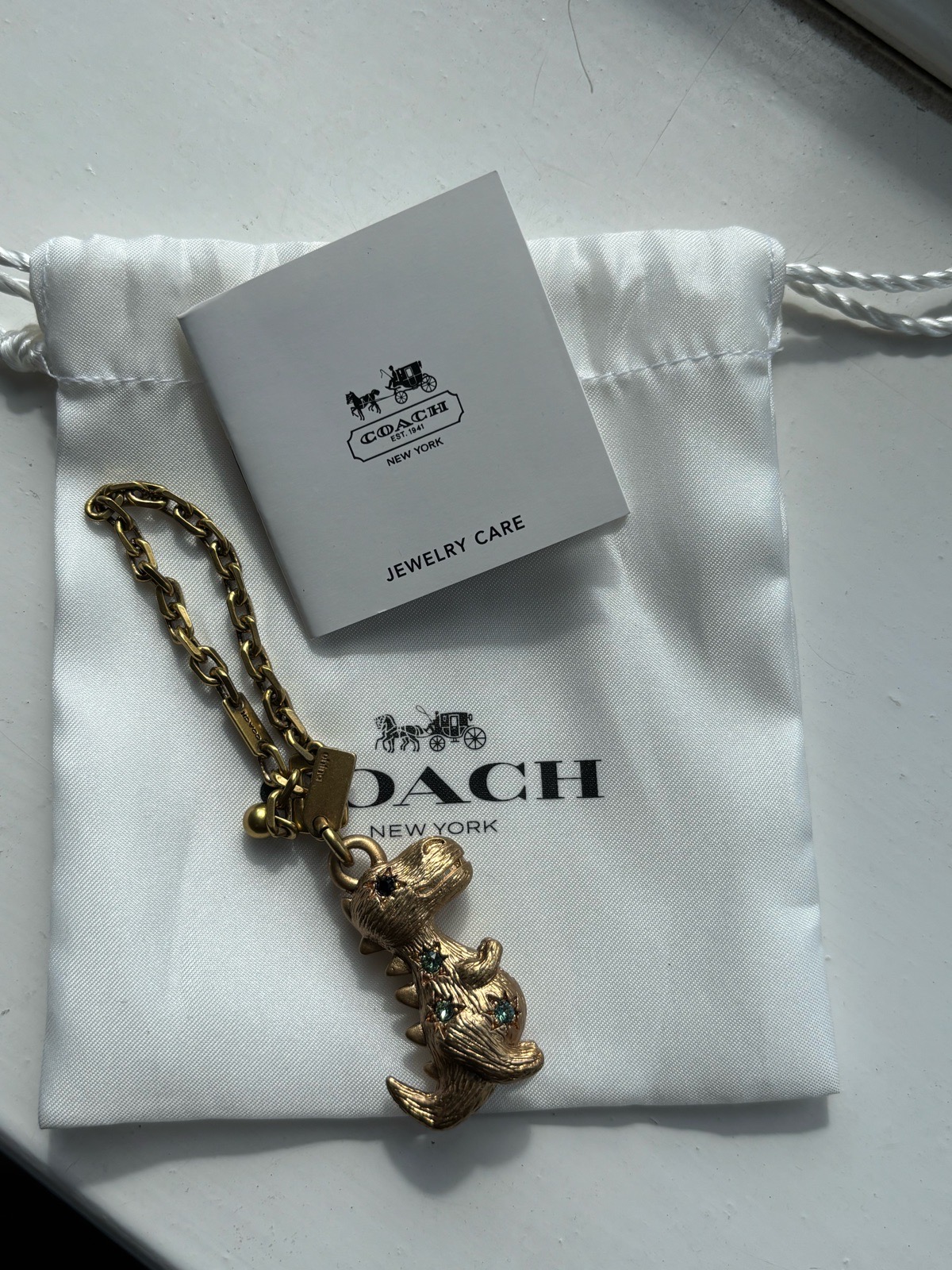Coach Dino bag charm