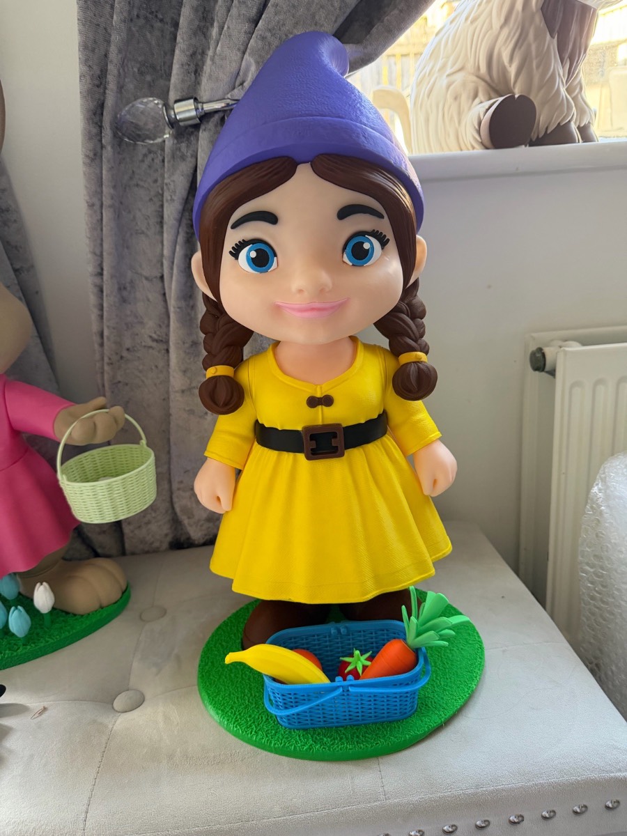 Adorable female Millie the garden gnome. Stands 50cm tall
