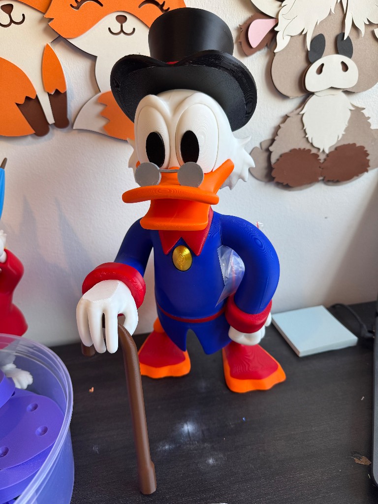 Adorable Disney Scrooge McDuck figurine stands 17.5cm tall