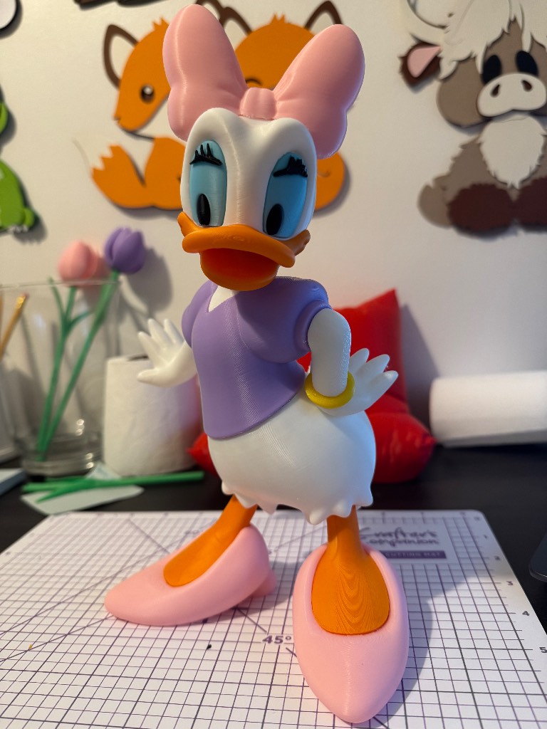 Adorable Disney Daisy Duck figurine stands 27cm tall