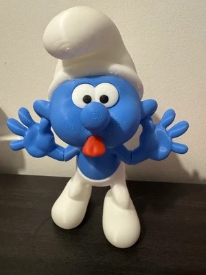 Adorable cheeky Smurf figurine