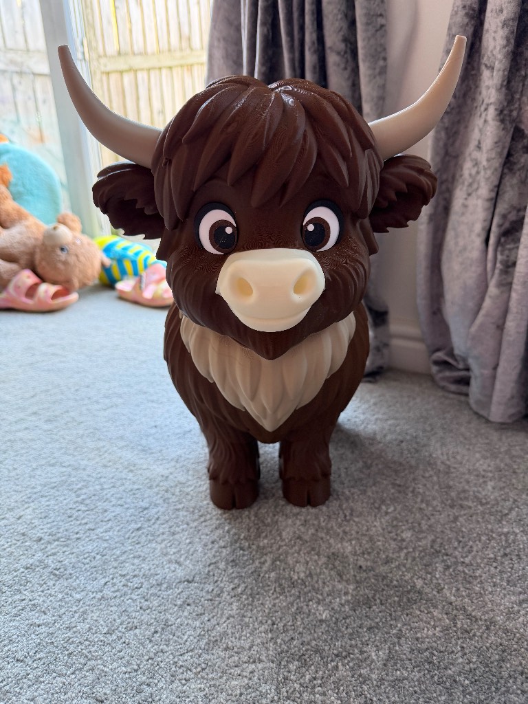 Adorable 3d printed standing highland cow figurine.