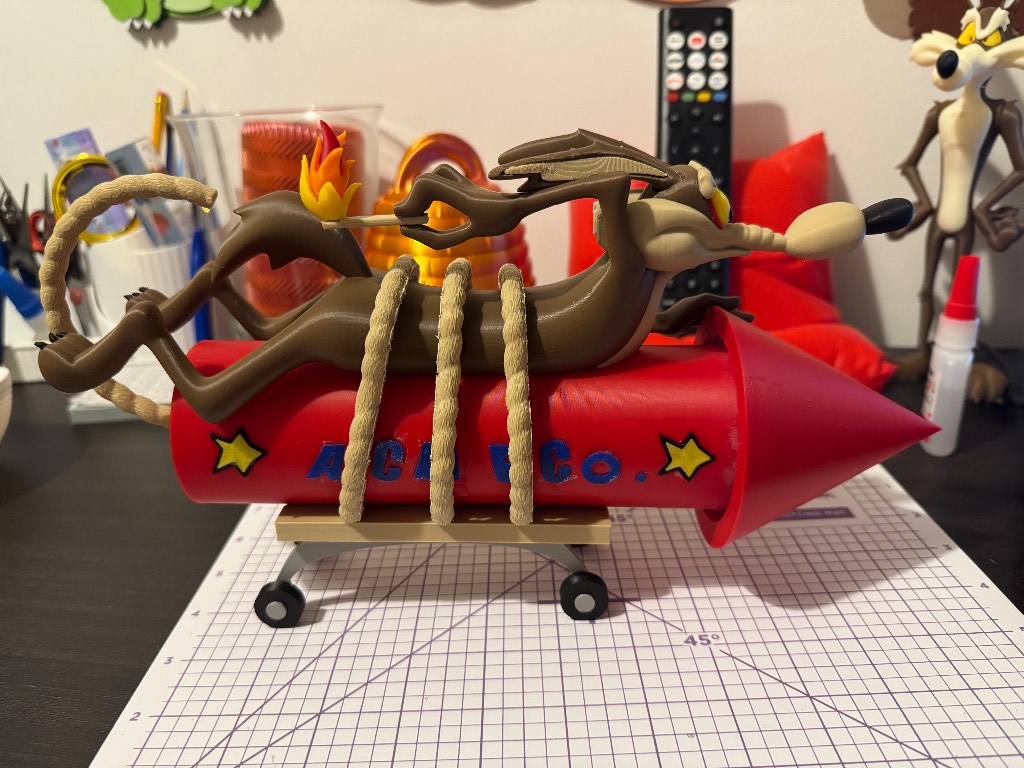 Warner bros looney tunes Wylie e coyote on a rocket  figurine