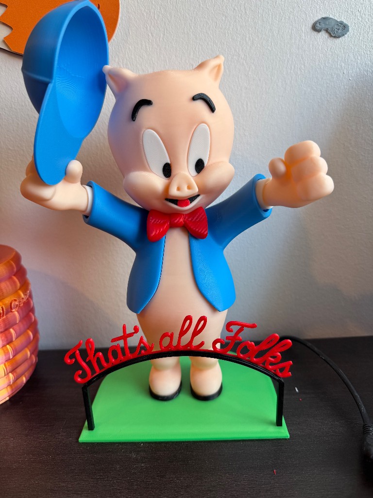 Warner bros porky pig figurine with stand and sign