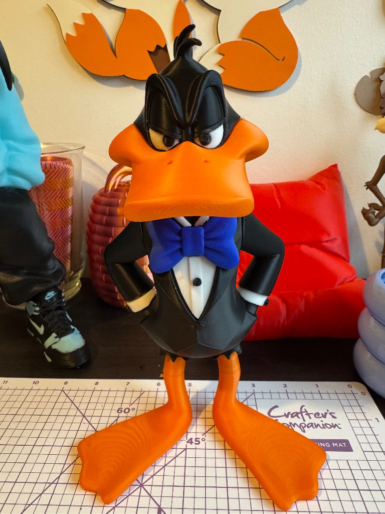 Adorable Warner bros Daffy Duck in a tuxedo figurine