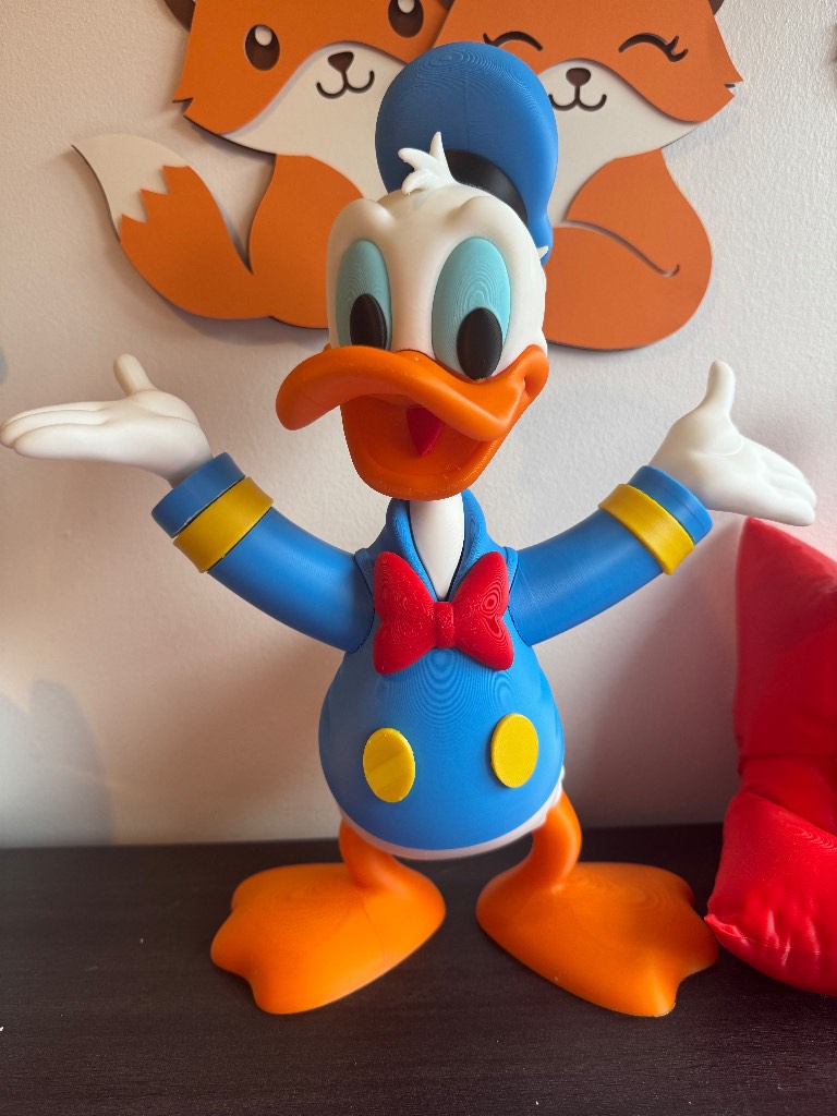 Adorable Disney Donald Duck figurine stands 22cm tall