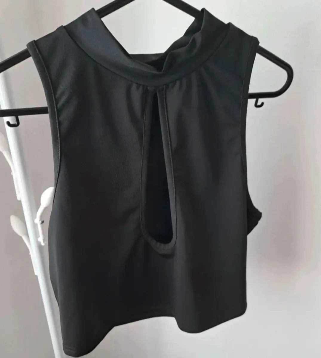 Black cropped top. Size large but comes up smaller