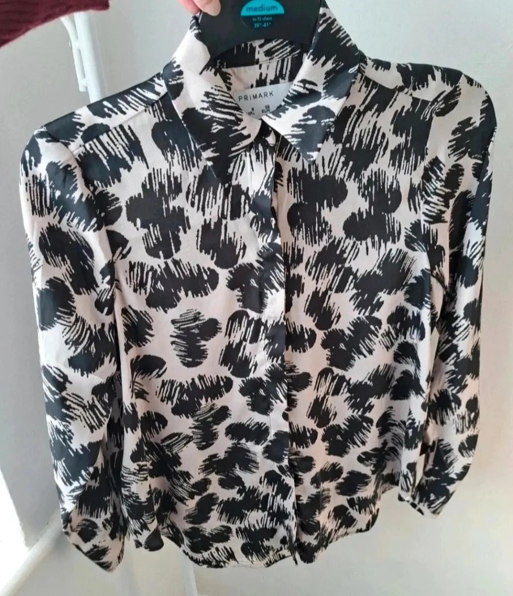 Black/beige patterned blouse. Size 8 by Primark