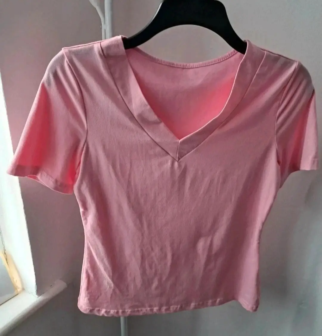 Pink short sleeve t-shirt.  Size large but measures smaller