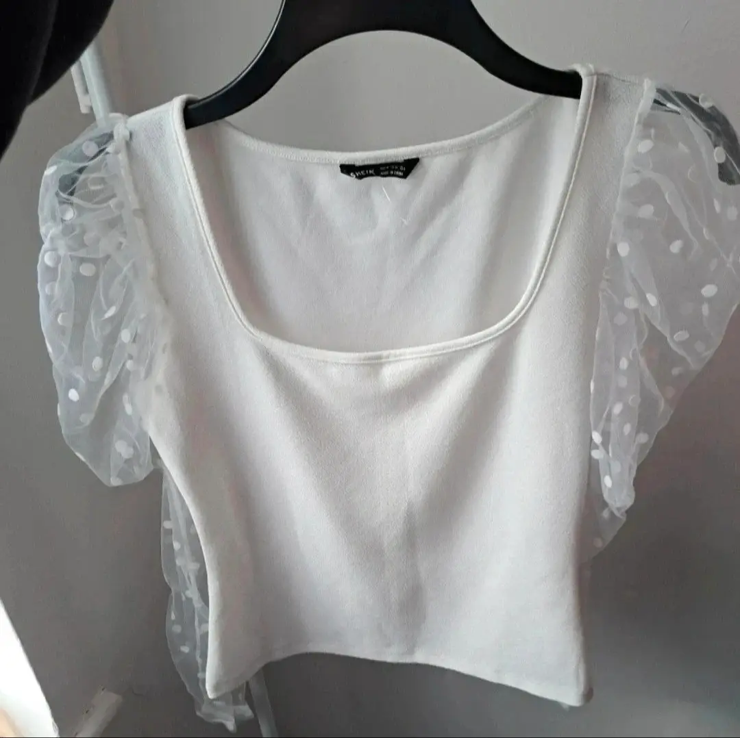 White top with long see through sleeves By shein. Size medium