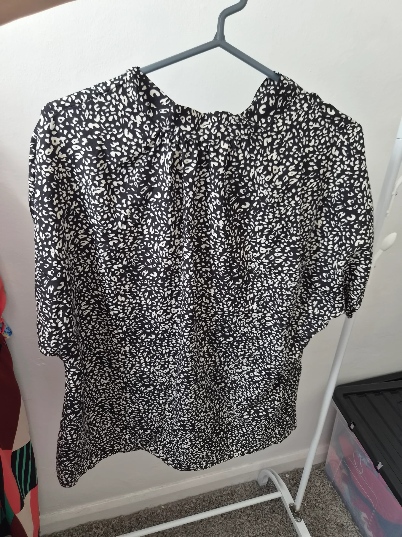Black and white patterned top. Size medium