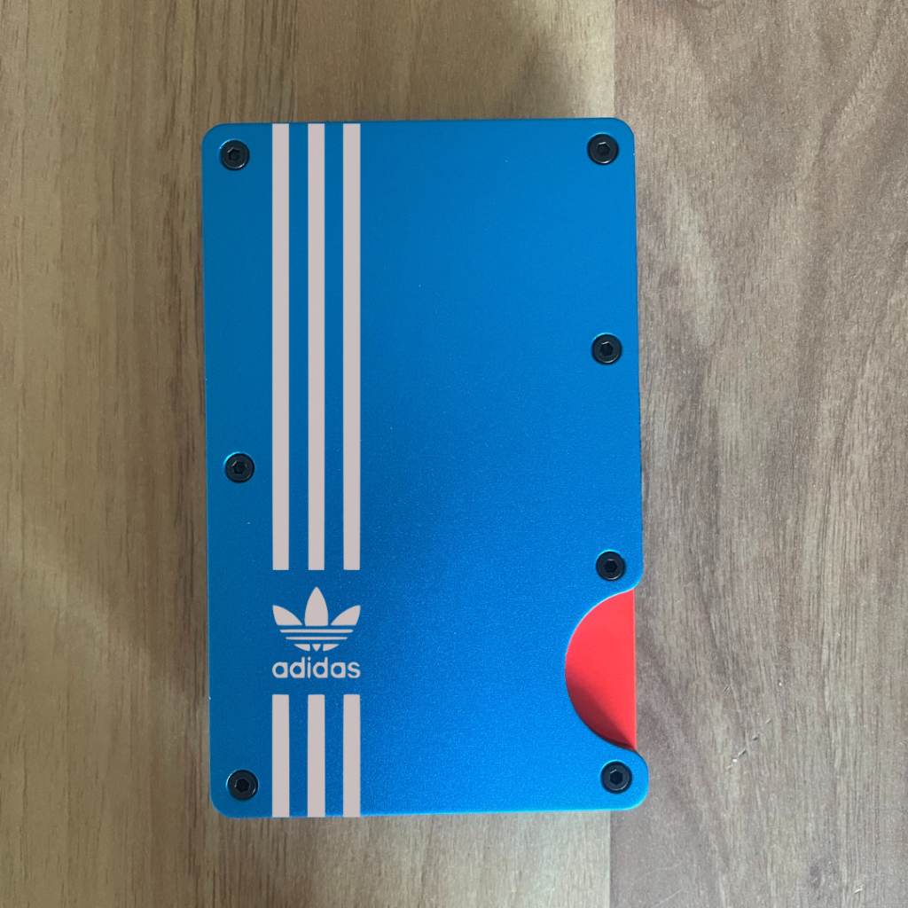 Adidas slim wallet designed to carry cards and cash