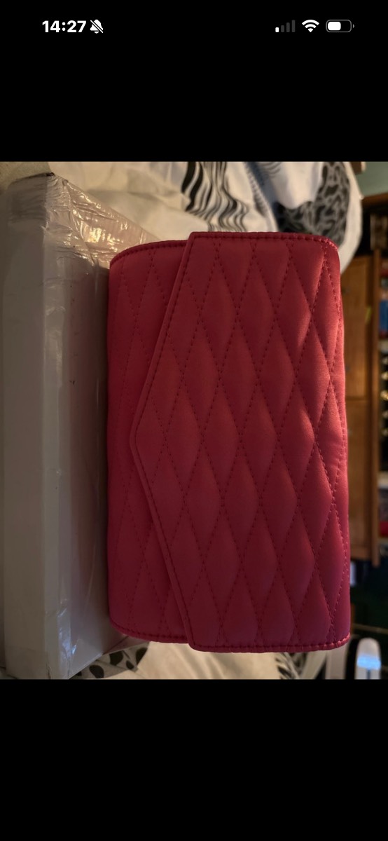 Pink clutch bag