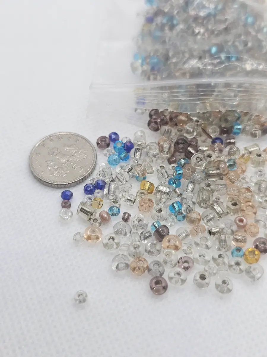 Loads of small seed beads multi coloured
