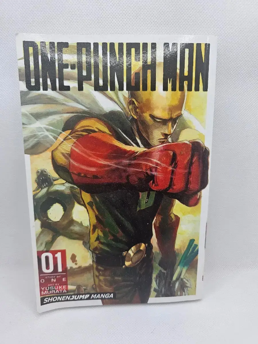 One Punch Man Manga Vol. 1 by Yusuke Murata English Edition