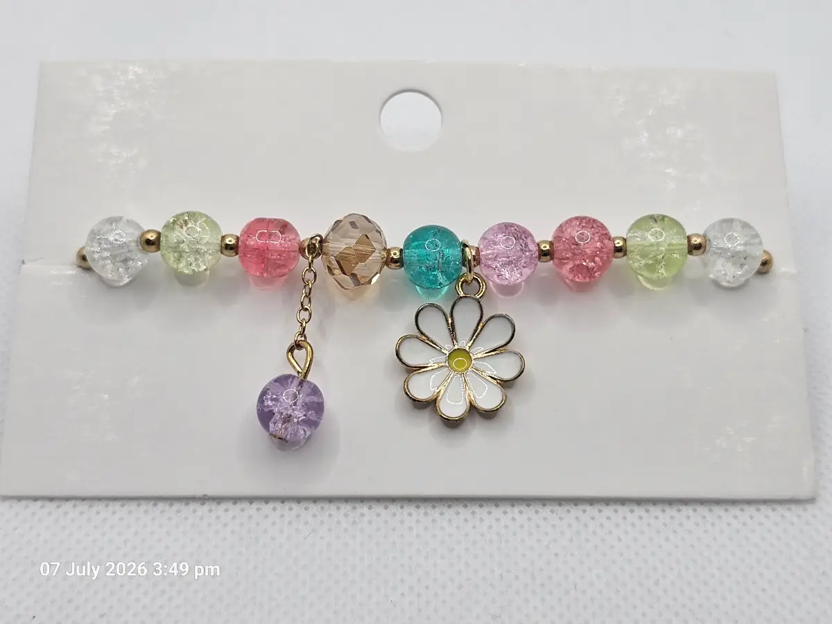 Handmade bright coloured bracelet with flower charm