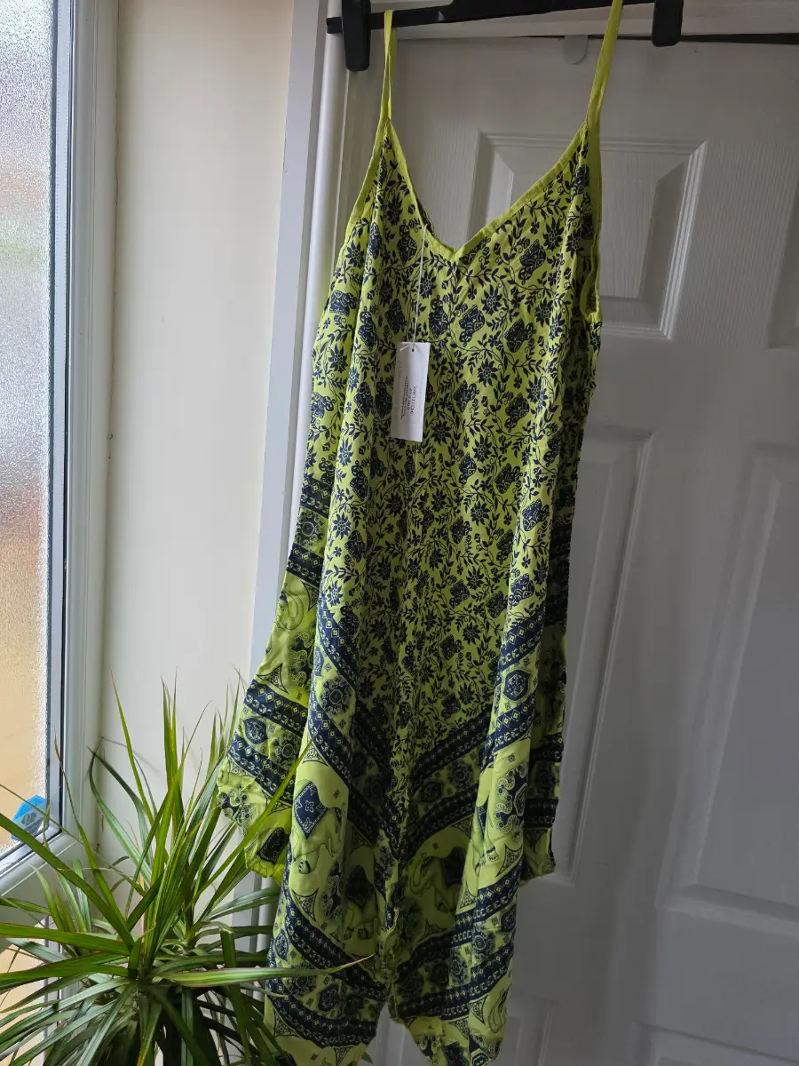 Brand new beach cover up size 14 to 22 one size