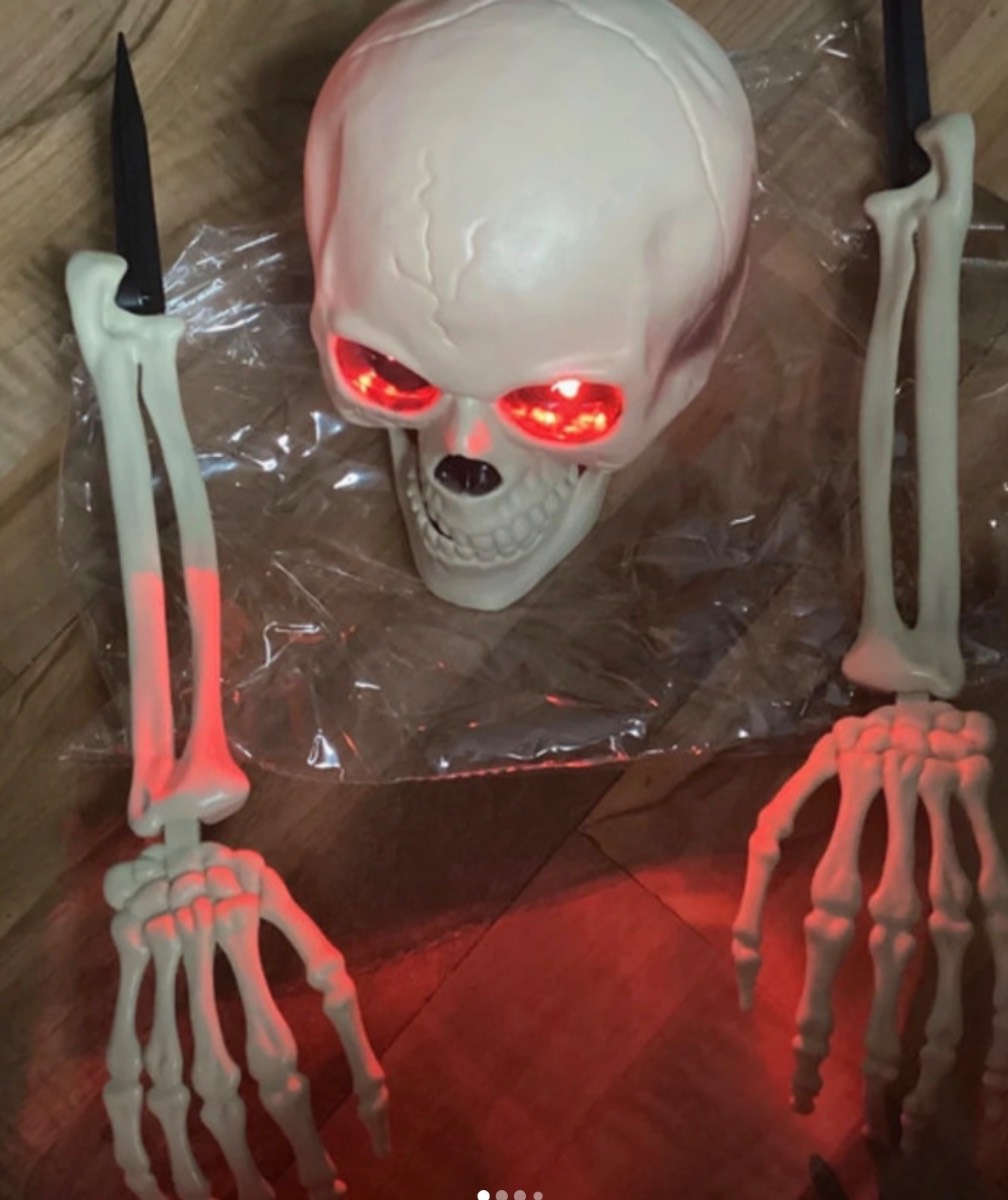 Halloween Skeleton with red led eyes with stakes in arms for garden new without tags