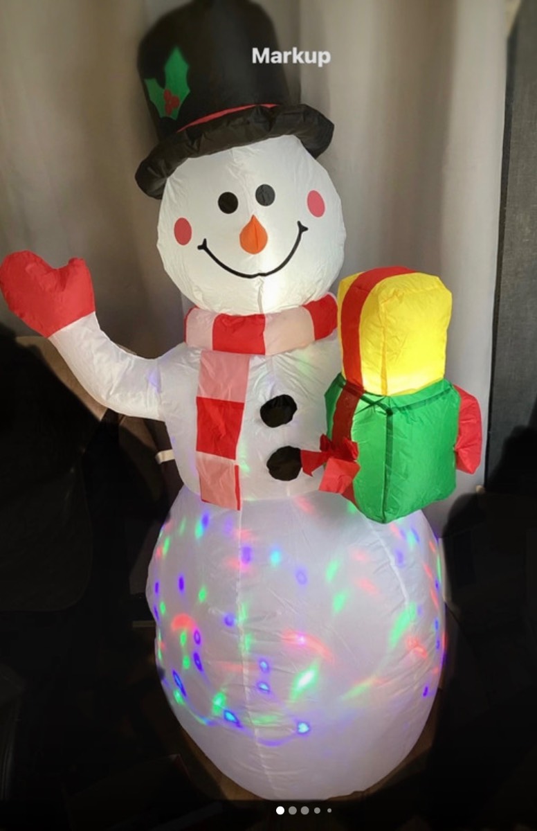 5ft christmas  outdoor inflatable wit( rotating colour lights just took out of box to shown item