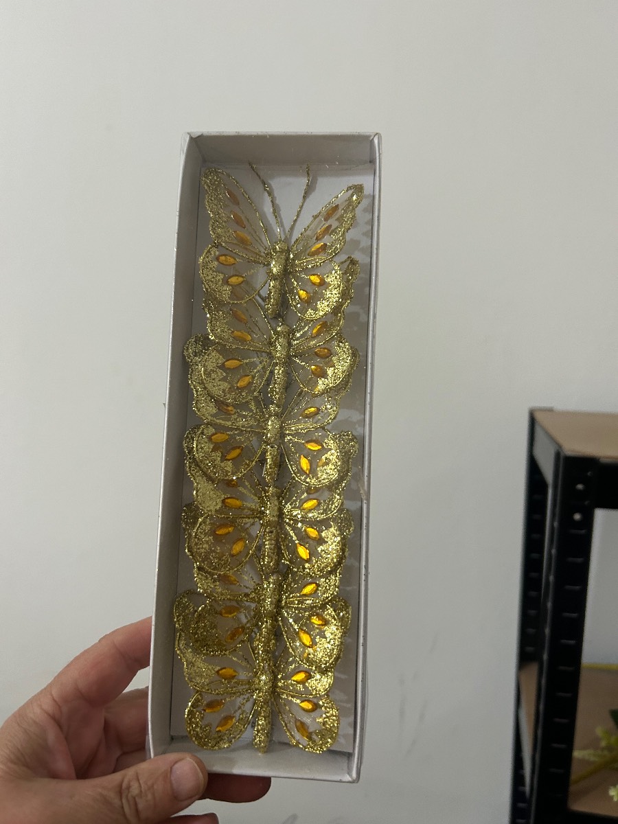 Gold sparkle clip back butterflies