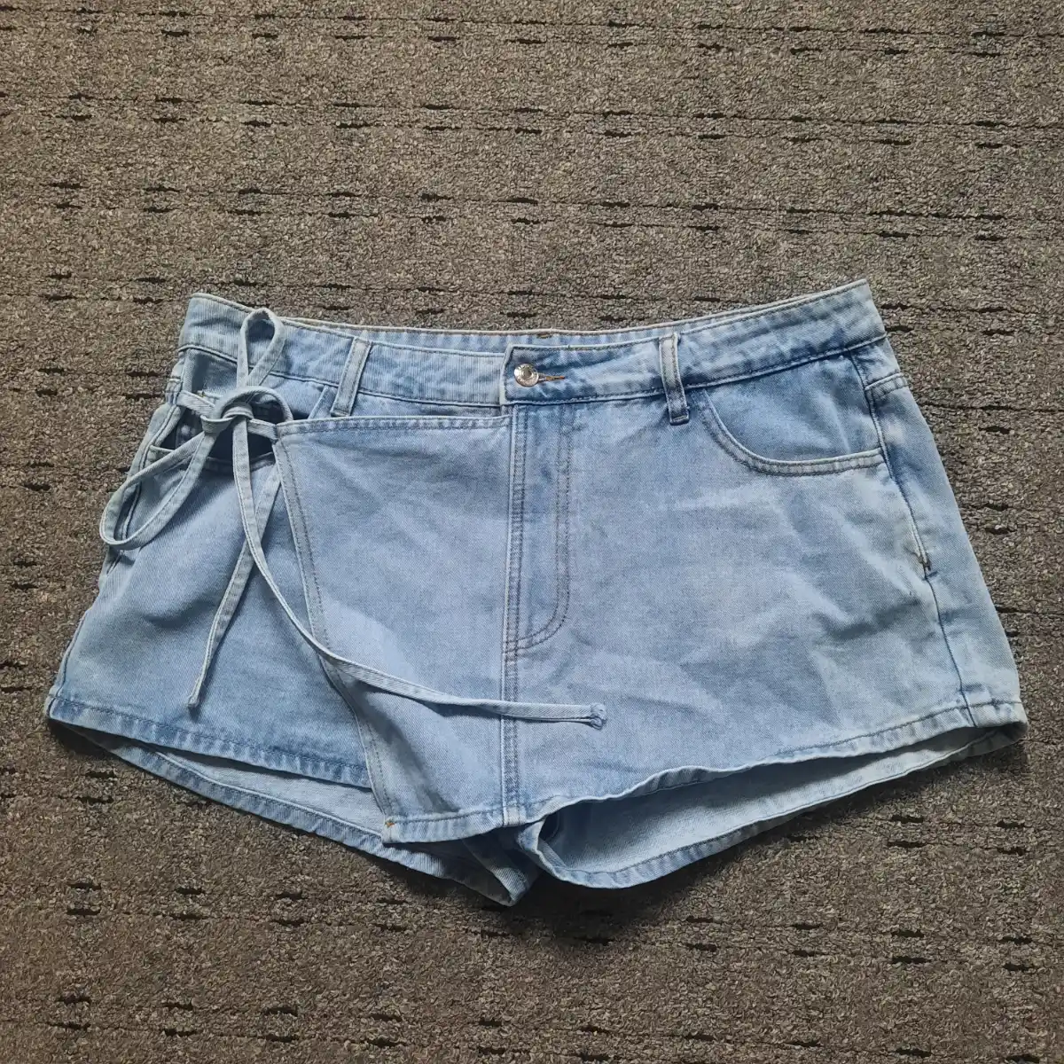 light wash denim shorts with tie belt