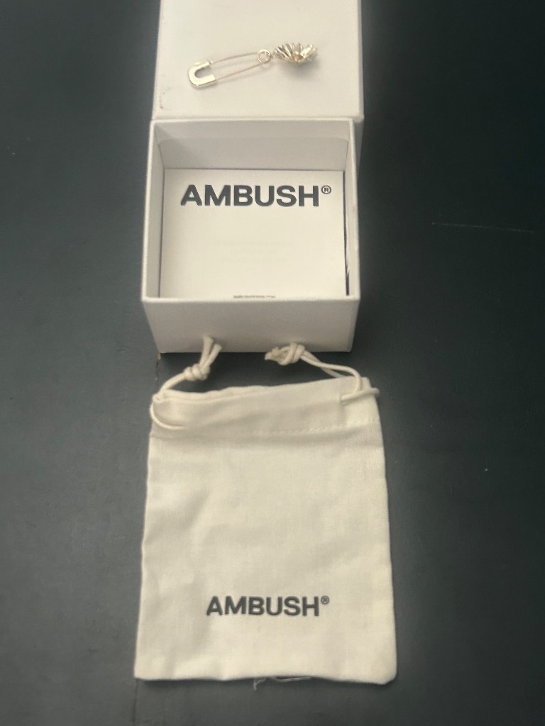 Boxed new ambush charm earring