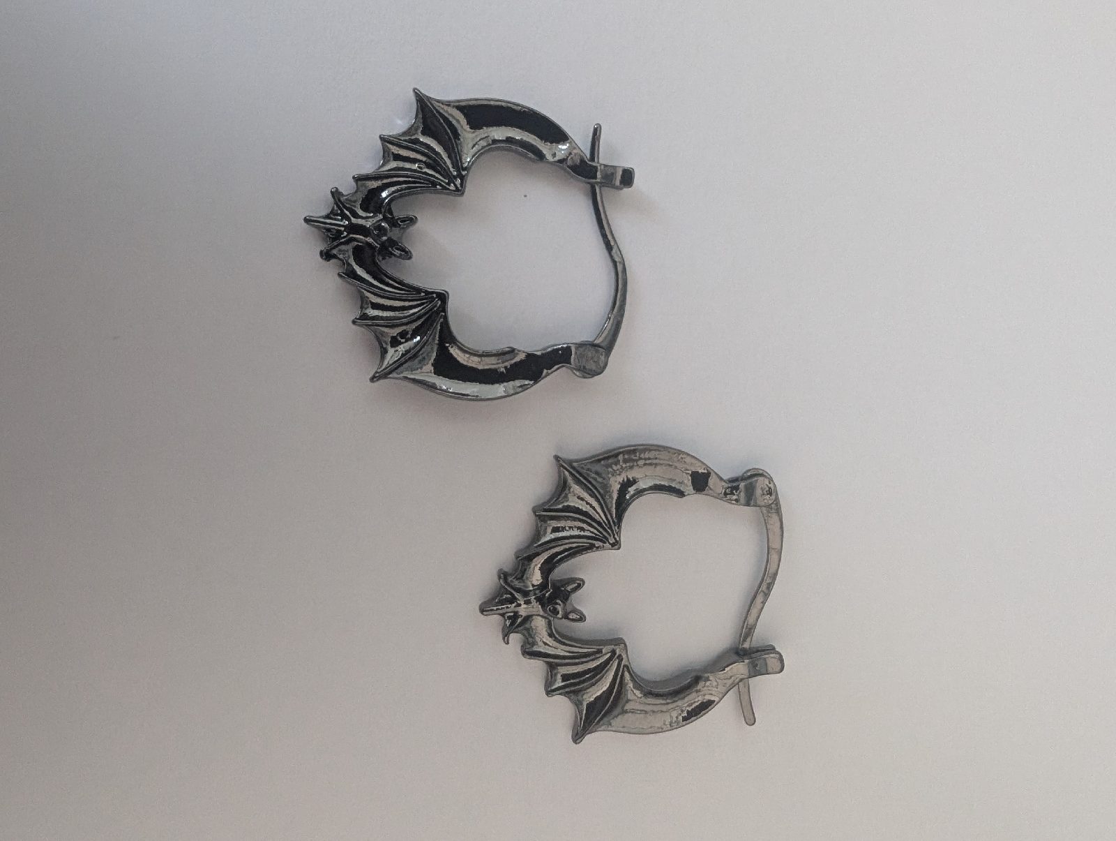 Gunmetal grey bat hoop earrings