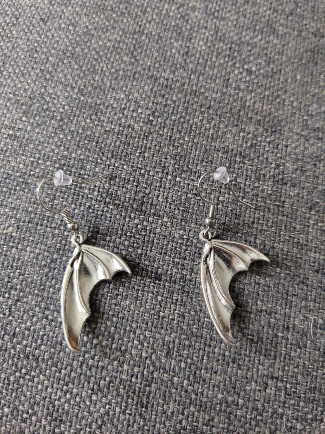 Bat wing earrings. New