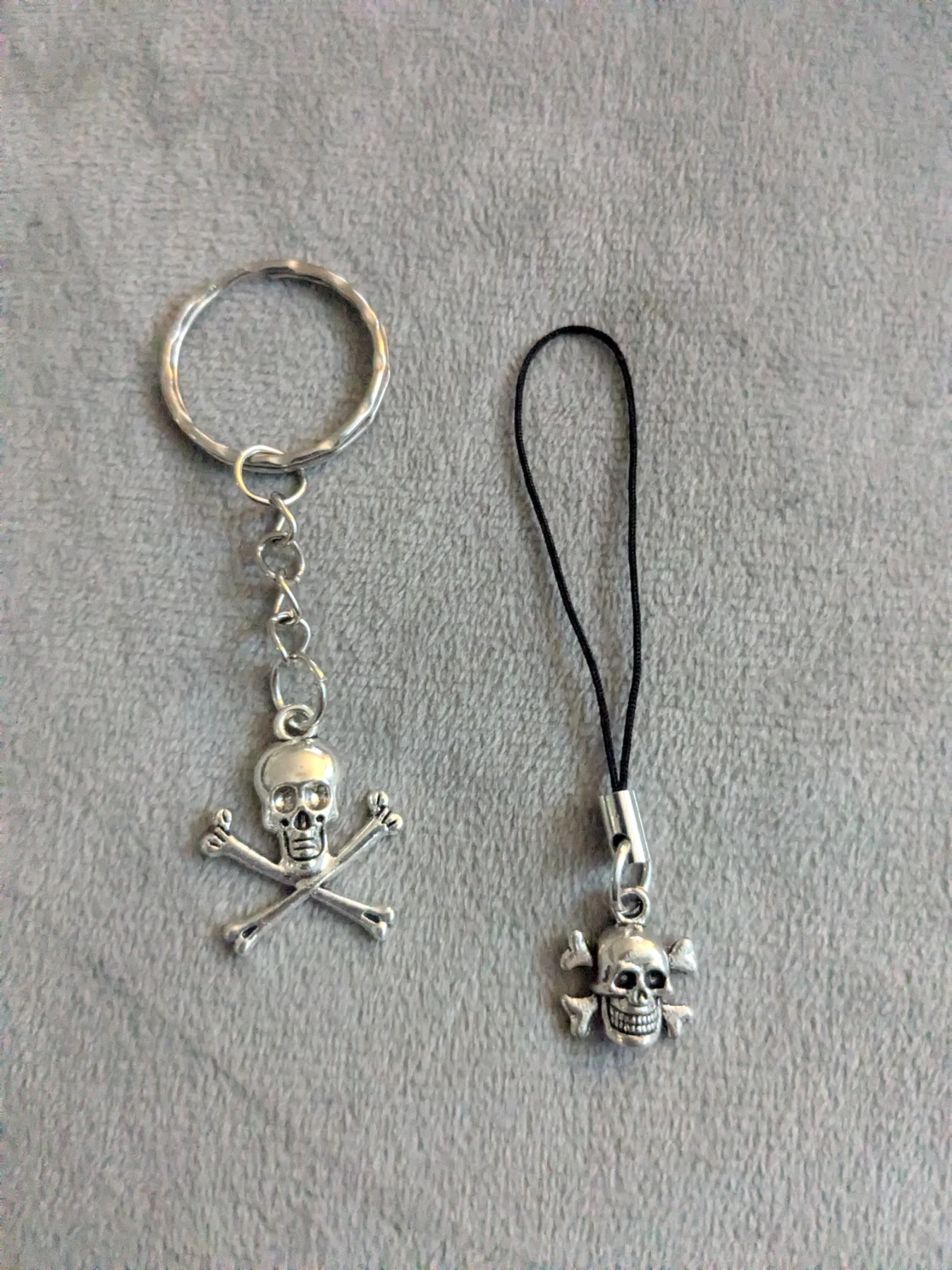 2 Skull phone charms. New