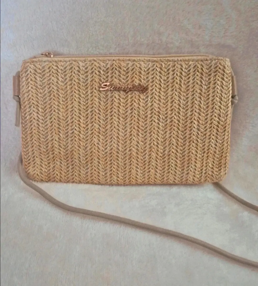 Ladies beige woven straw across body handbag