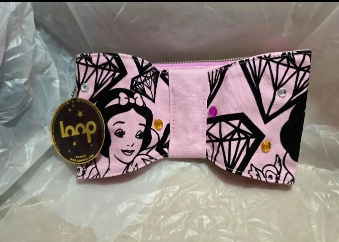 Disney Couture by Loop NYC Snow White bow cosmetic pouch/clutch from their 2010 collaboration.