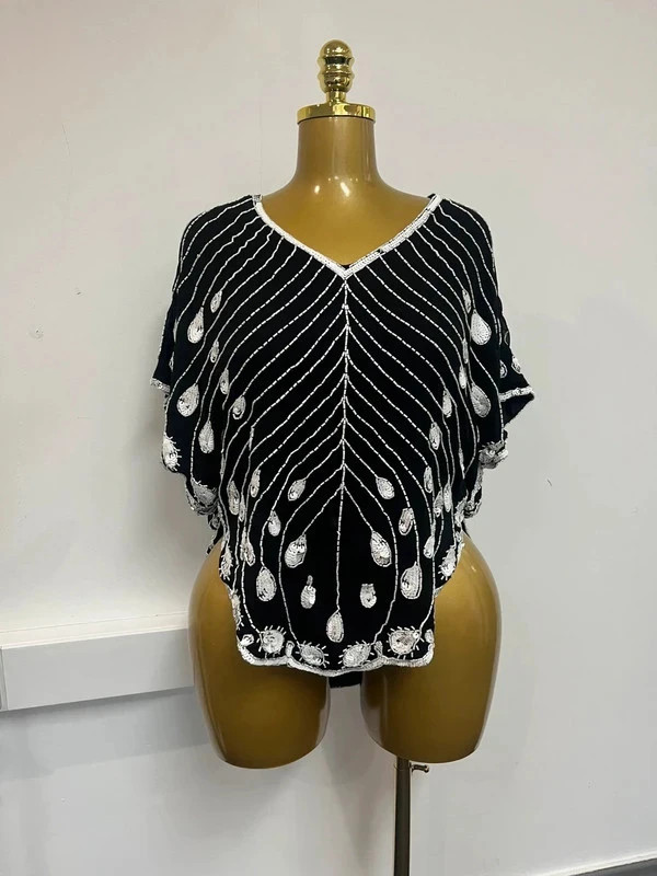 Lydia bright 1920s style black and white pull over top poncho y2k