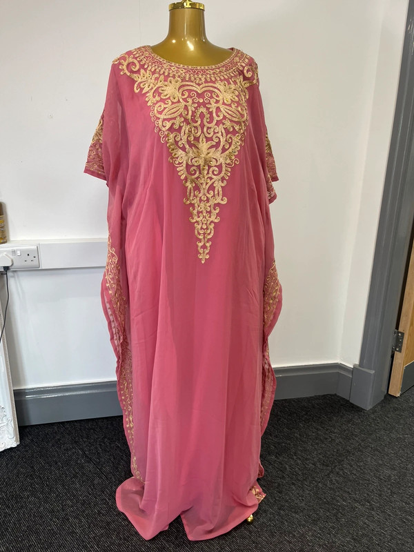 Women’s pink and gold long double layered abaya bought in Dubai