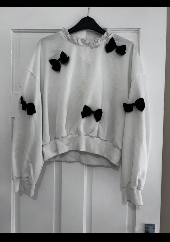 Bows on sweater