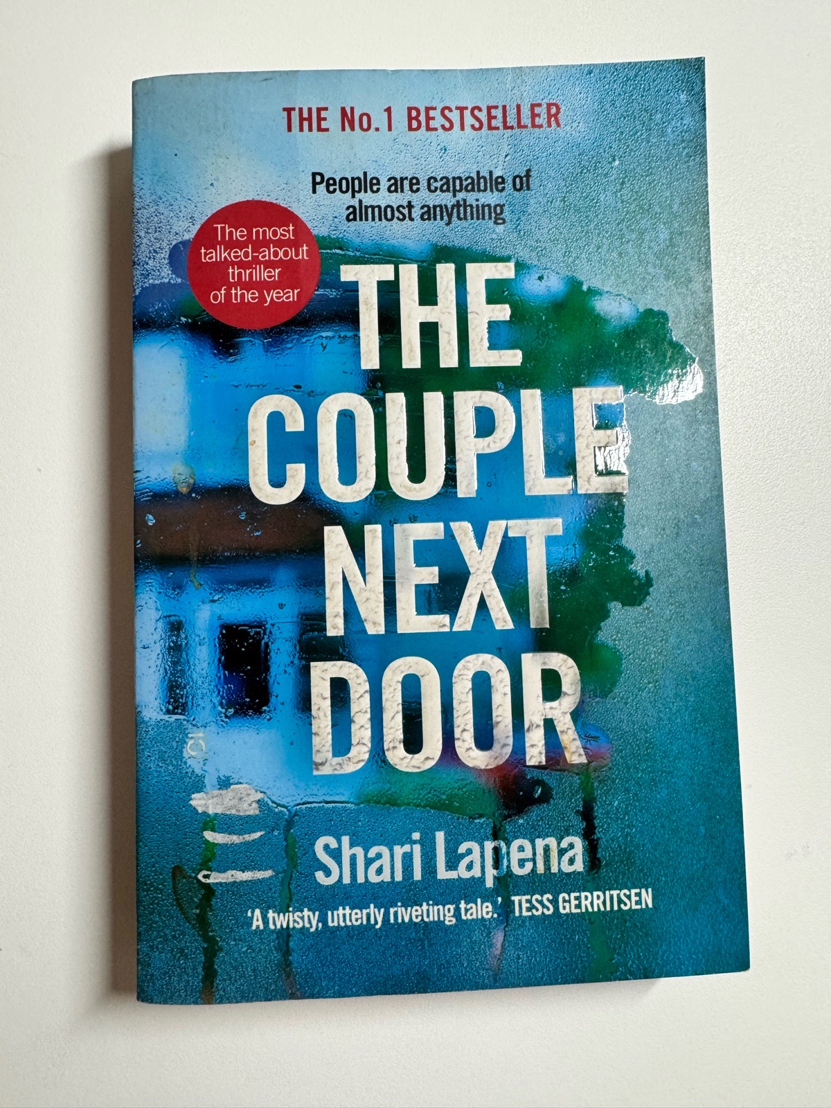 The couple next door by Shari Lapena