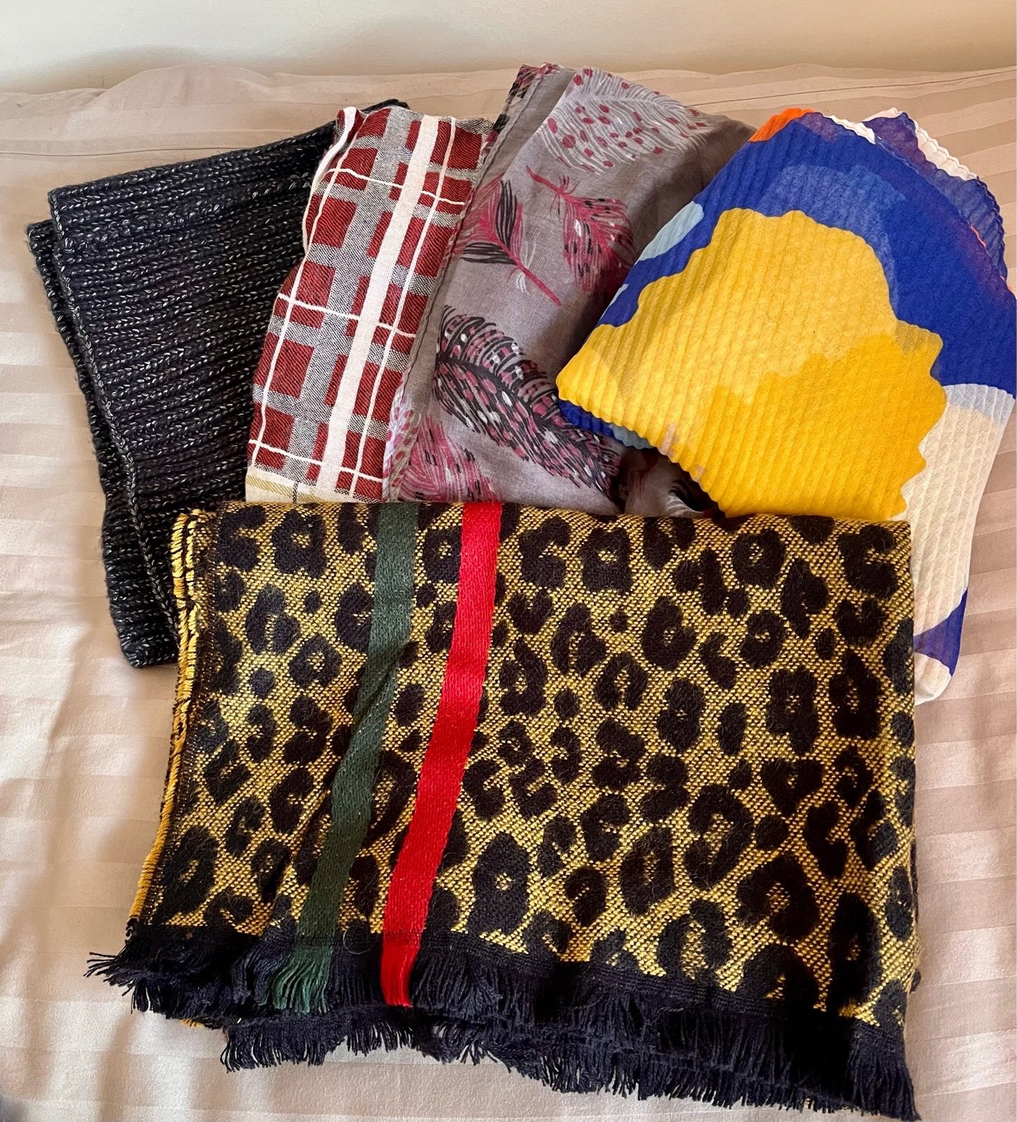 Bundle of scarves, pashminas, snood