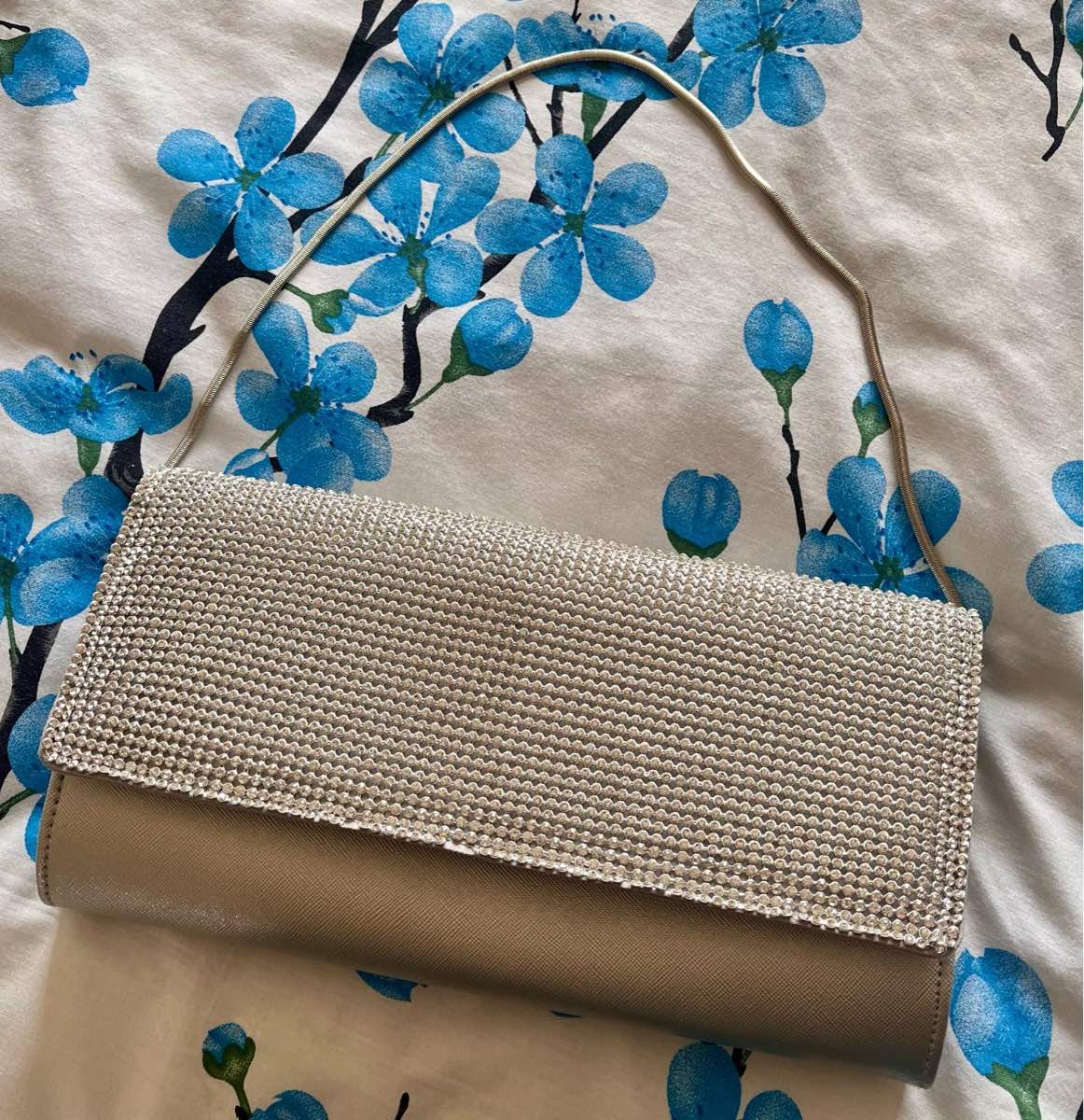 Silver rhinestone encrusted clutch bag with chain handle
