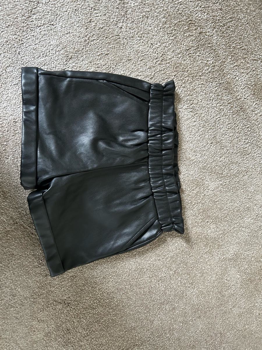 Girls PU black shorts aged 6-7