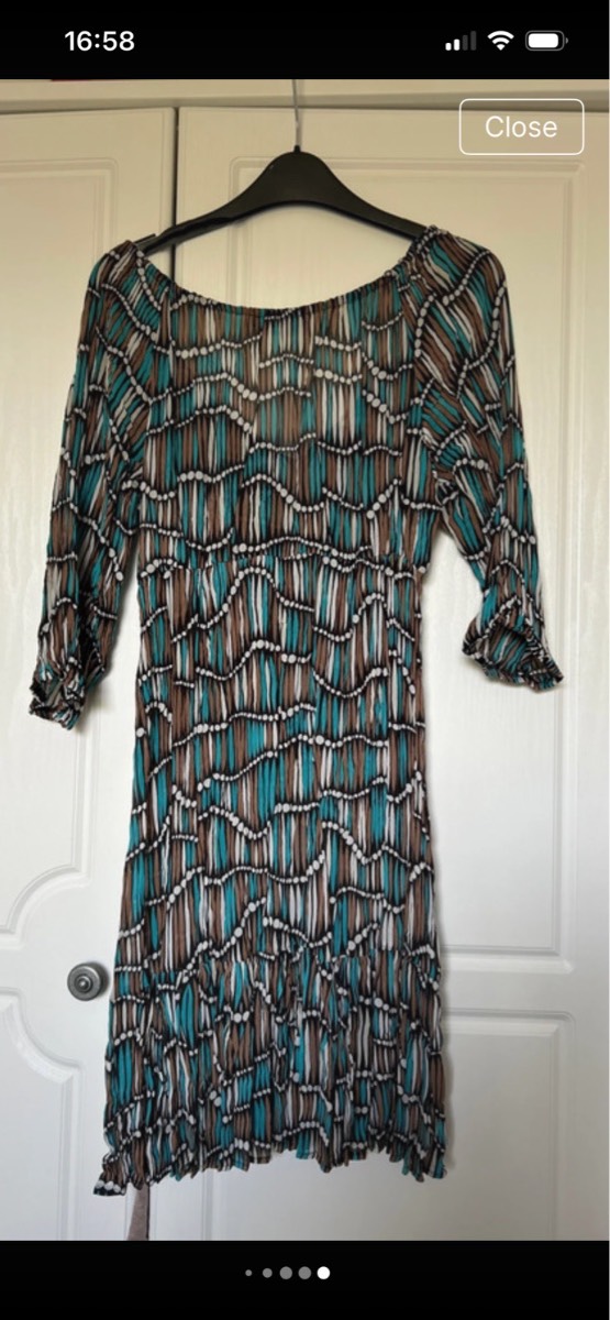 Beach cover / holiday dress size 10-12
