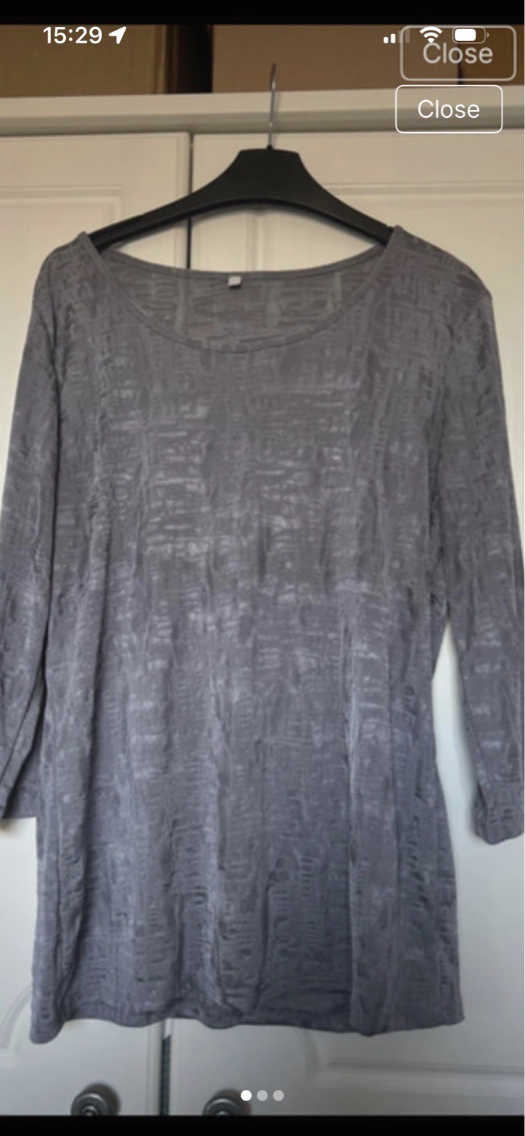 Long sleeved semi sheer top size M 10-12
