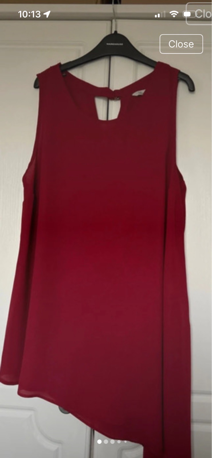 Asymmetrical burgundy top size 16