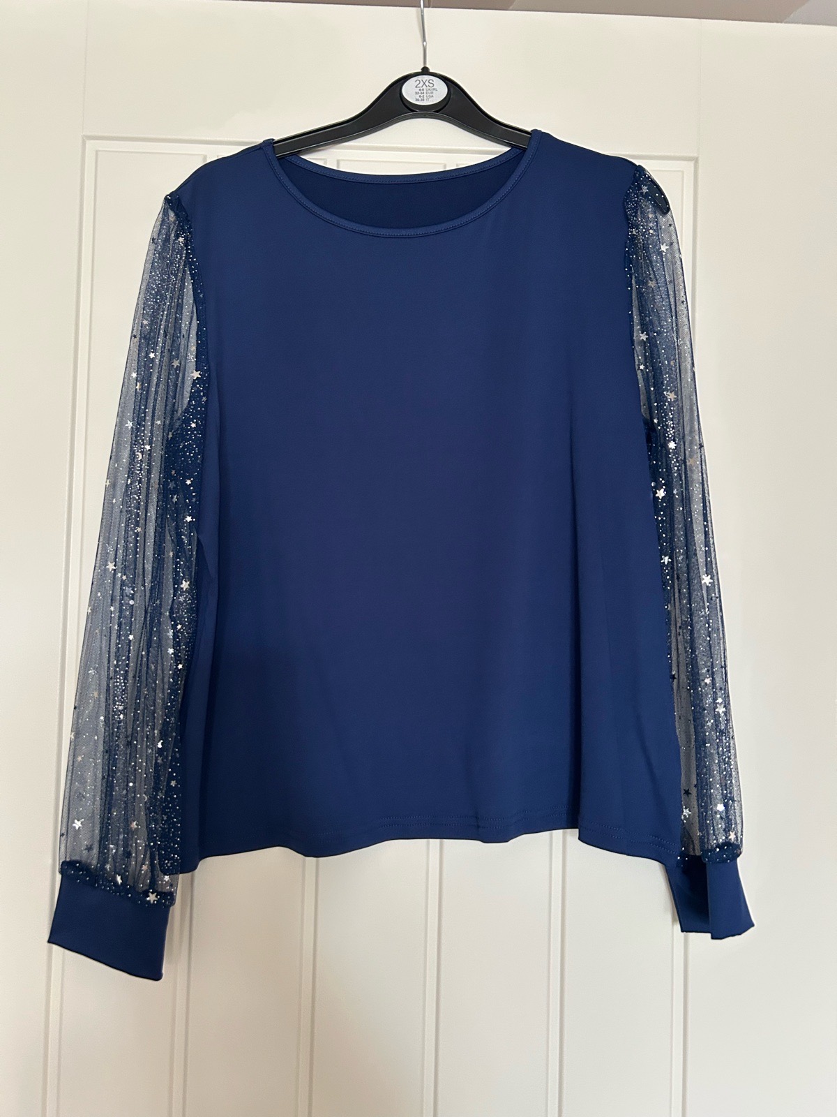 Navy top size 12-14
