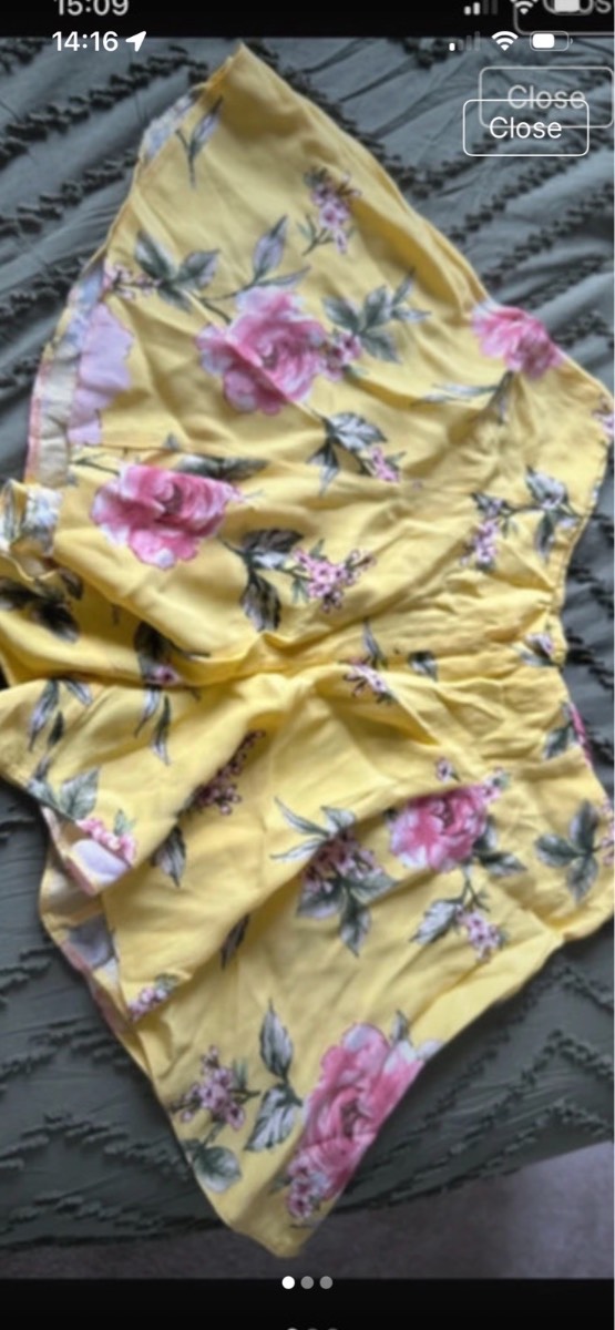 Flared floral yellow shorts size 14