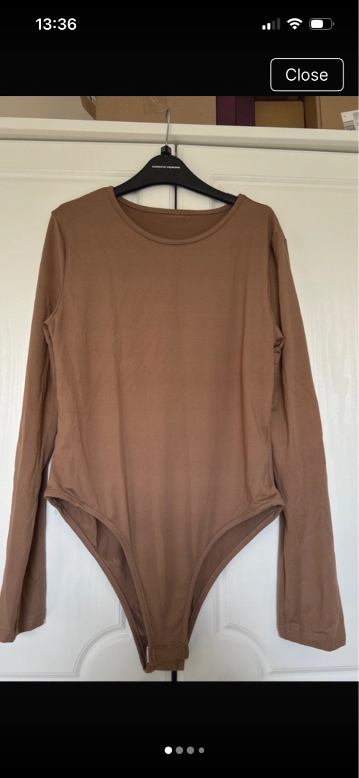 Brown long sleeved bodysuit size L 12-14