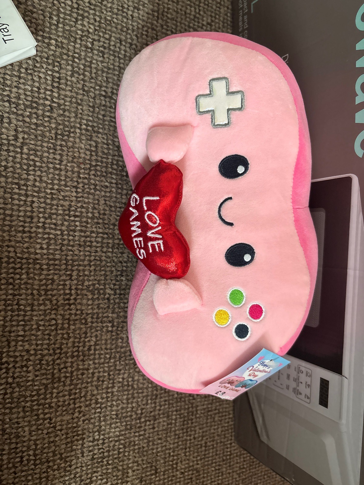 Pink controller plushy