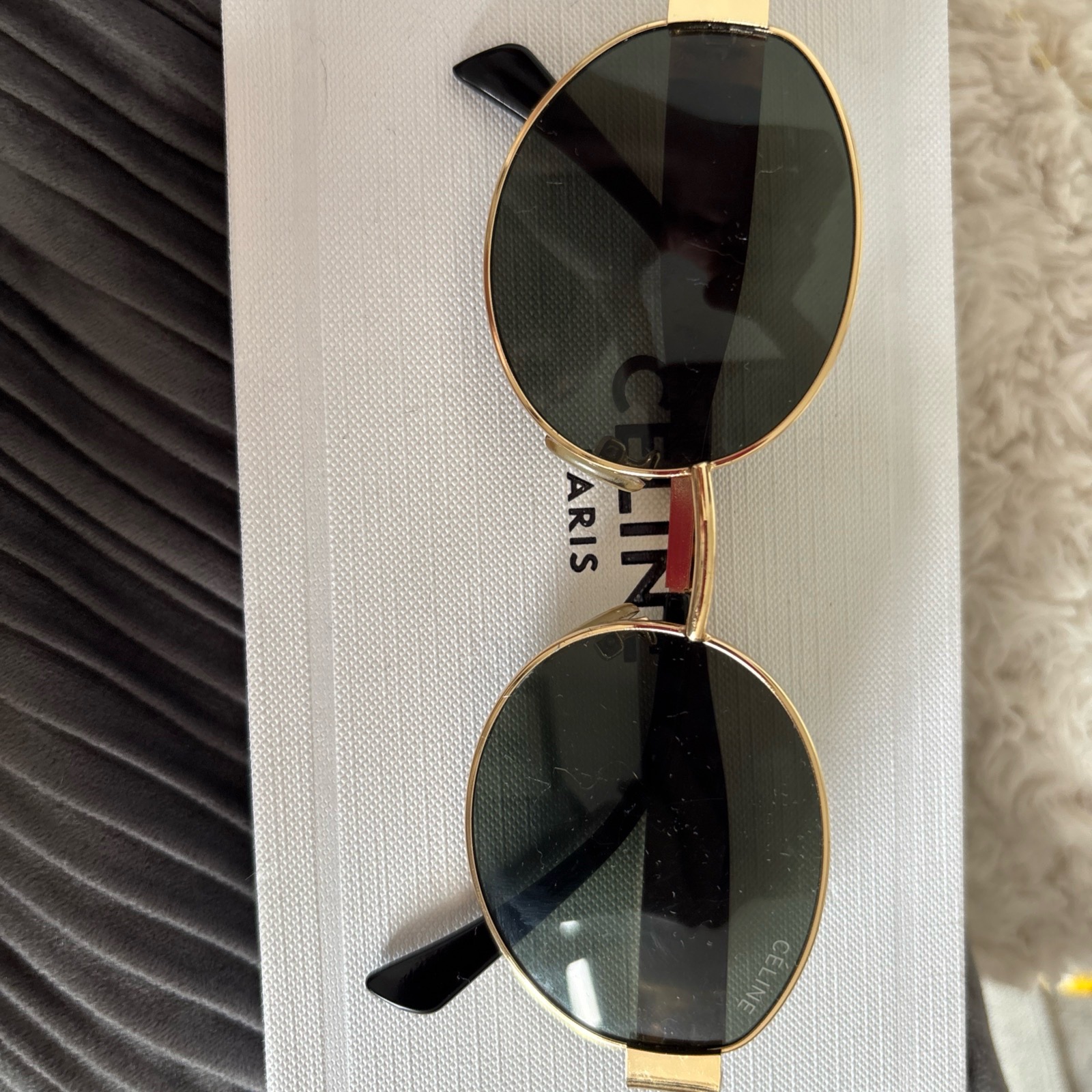 The Celine Triomphe Metal 01 Oval Sunglasses in gold