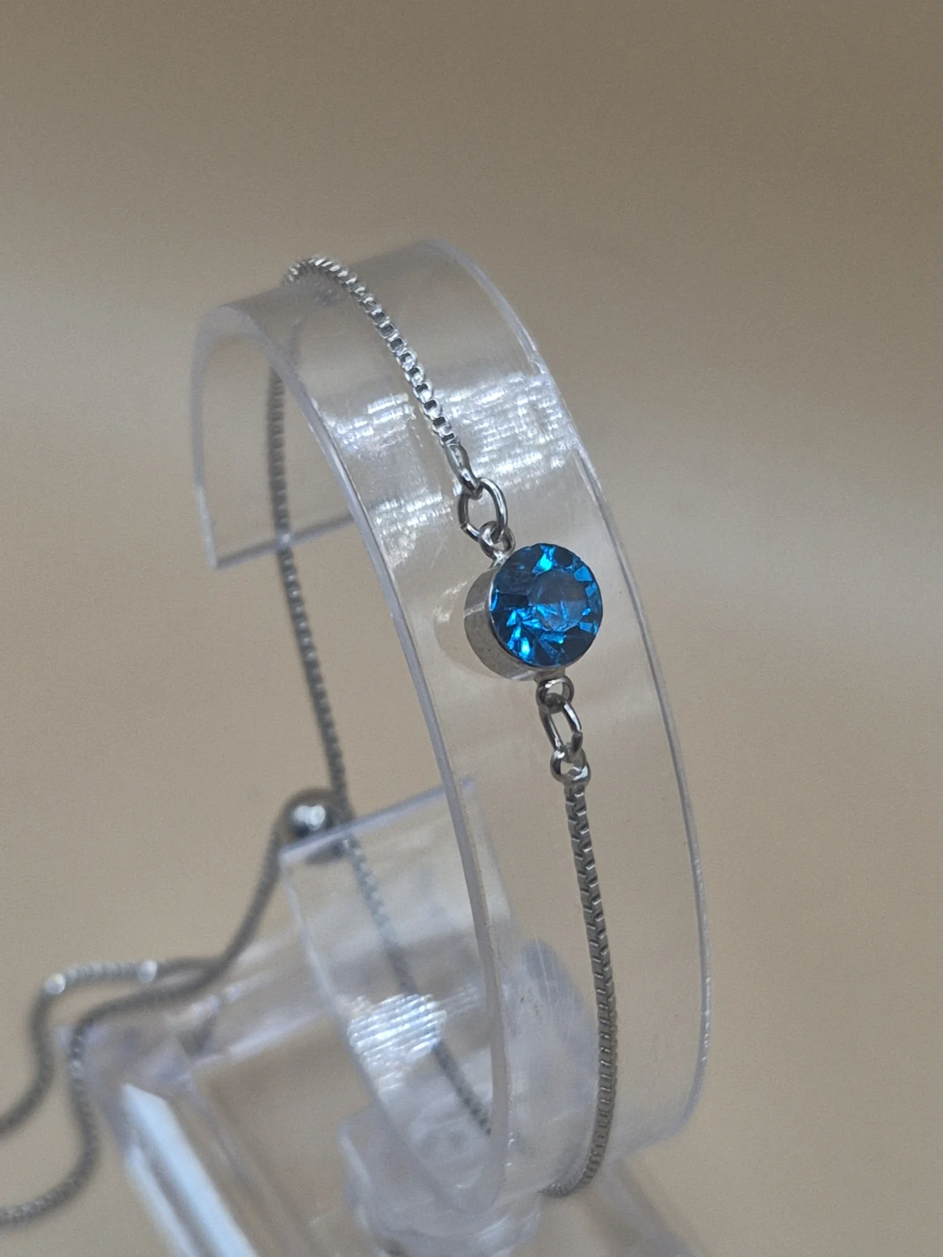 Silver Tone Tennis Bracelet with Blue Crystal and Slider Clasp (B85)